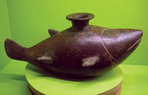 ceramic vessel in the shape of a shark