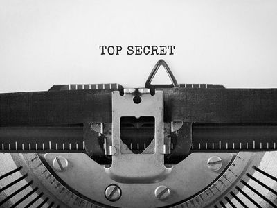 Text Top Secret typed on retro typewriter