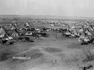 Bird's eye view of a Lakota Sioux Indian camp near Pine Ridge Indian Reservation, South Dakota, 1891. Photographed by John Grabill.