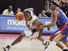 United States' Kobe Bryant, left, drives past Puerto Rico's Elias Ayuso during in the third quarter of their FIBA Americas Championship basketball game at the Thomas & Mack Center in Las Vegas, Saturday, Sept. 1, 2007