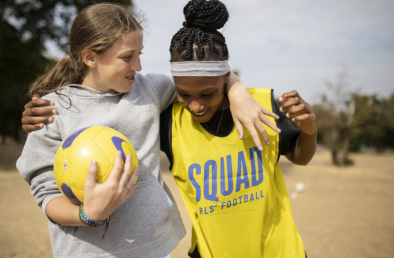 Two players at a Squad Girls football session