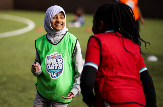 Girls smiles at Weetabix Wildcats football session