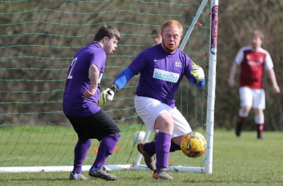 Goalkeeper clears the ball