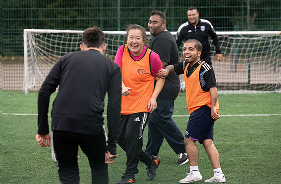 A disability football coaching session
