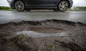 Pothole costs UK roads