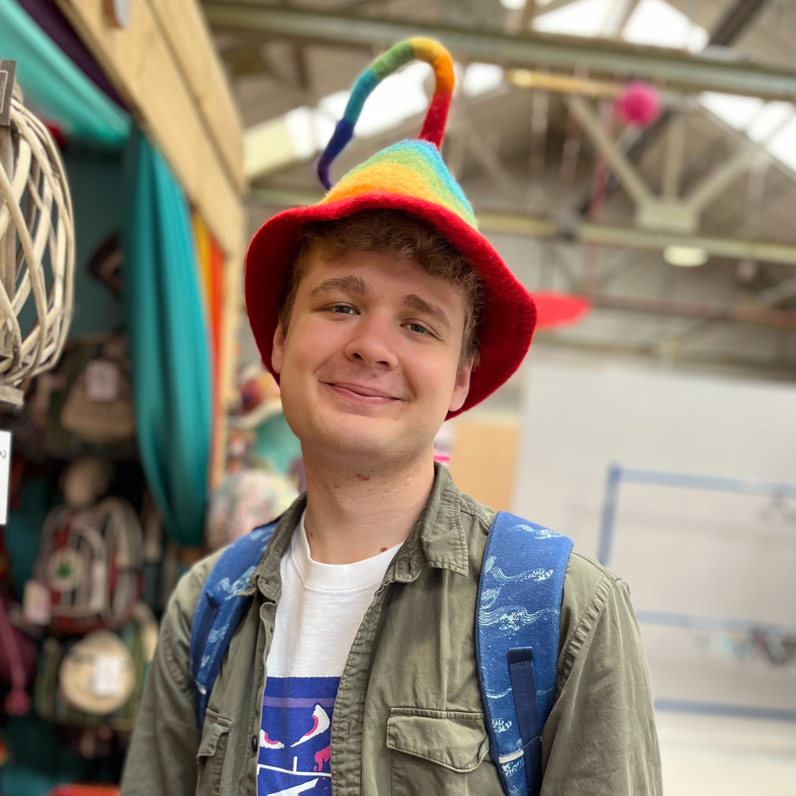 TechRadar author Dashiell Wood wearing a whimsical hat.