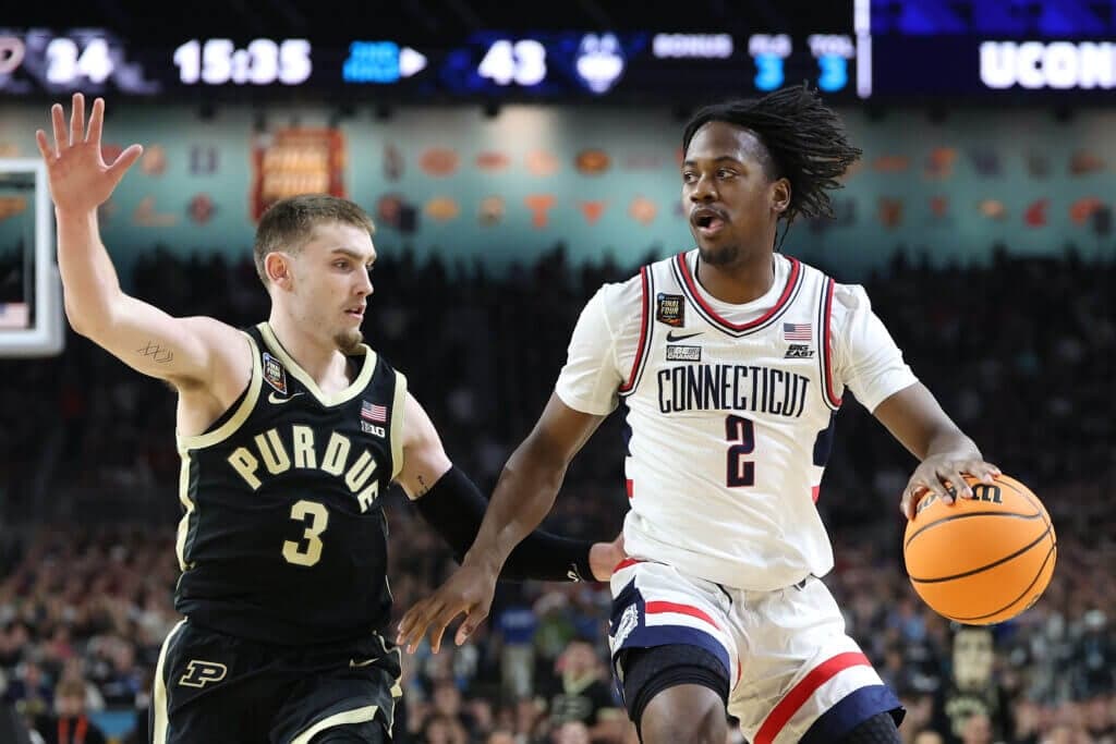 UConn's Tristen Newton and Dan Hurley met in the middle. It led to two titles
