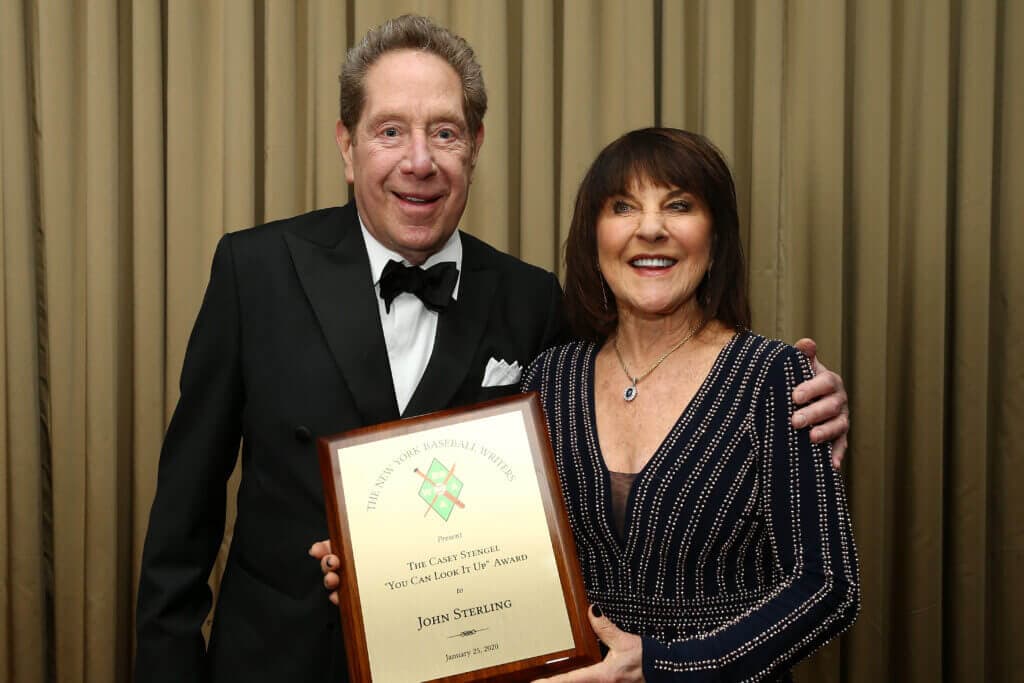 NEW YORK, NEW YORK - JANUARY 25: John Sterling and Suzyn Waldman pose for a photo during the 97th annual New York Baseball Writers&#039; Dinner on January 25, 2020 Sheraton New York in New York City. (Photo by Mike Stobe/Getty Images)