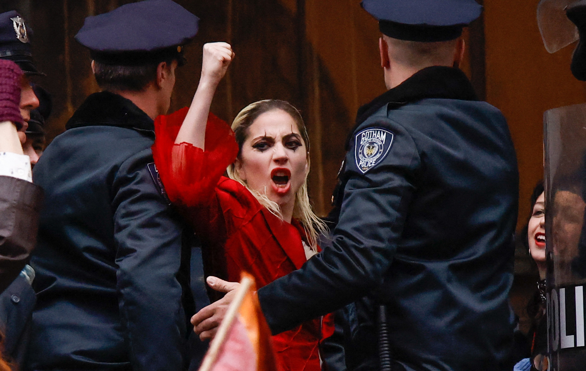 Lady Gaga performs during the filming of the movie "Joker: Folie à Deux" in New York on March 25, 2023. The ‘Joker' sequel starring Lady Gaga and Joaquin Phoenix filmed outside the courthouse where the grand jury investigating former US President Donald Trump meets. (Photo by KENA BETANCUR / AFP)