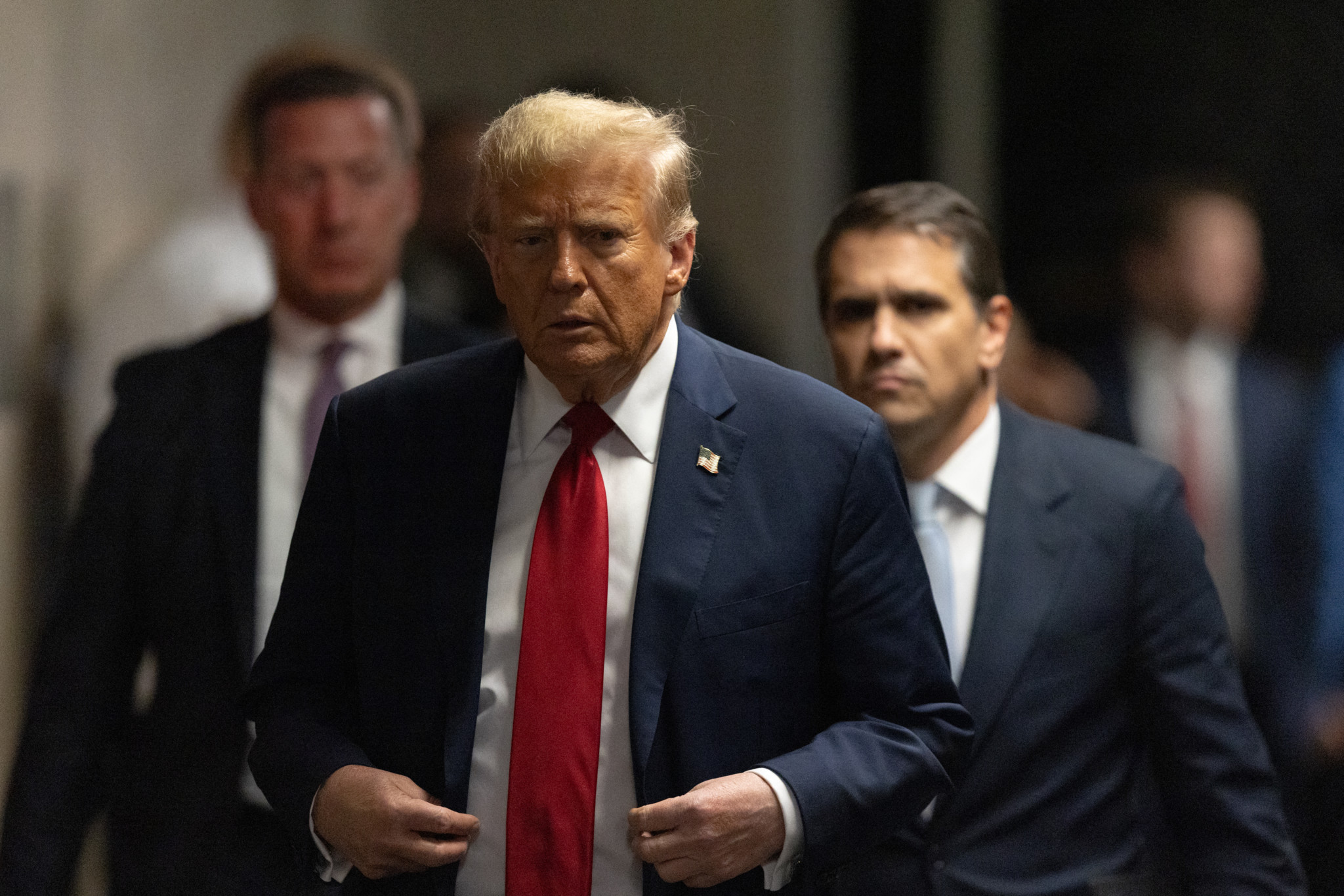 NEW YORK, NEW YORK - APRIL 25: Former U.S. President Donald Trump exits his criminal trial for allegedly covering up hush money payments at Manhattan Criminal Court on April 25, 2024 in New York City. Trump was charged with 34 counts of falsifying business records last year, which prosecutors say was an effort to hide a potential sex scandal, both before and after the 2016 presidential election. Trump is the first former U.S. president to face trial on criminal charges.   Jeenah Moon-Pool/Getty Images/AFP (Photo by POOL / GETTY IMAGES NORTH AMERICA / Getty Images via AFP)