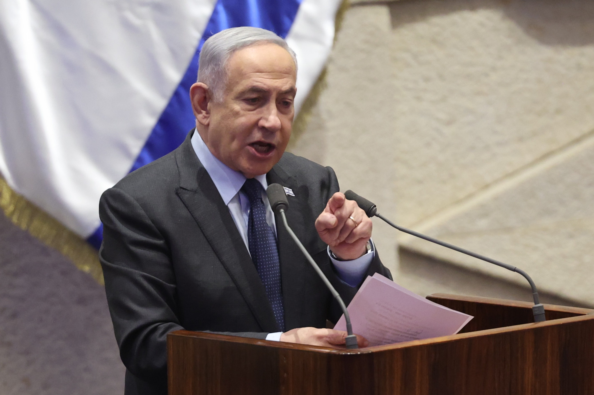 epa11166727 Israeli Prime Minister Benjamin Netanyahu speaks during the voting session for the impeachment of Hadash-Taâ€™al party MP Ofer Cassif in Jerusalem, 19 February 2024. The motion was brought up after Cassif publicly supported South Africaâ€™s genocide case against Israel at the International Court of Justice (ICJ).  EPA/ABIR SULTAN