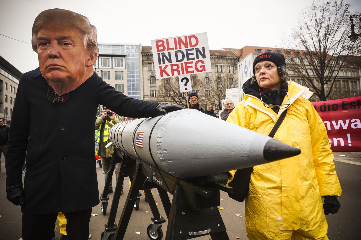 Activists marches with a model of a nuclear rocket during a demonstration against nuclear weapons on in Berlin, Germany, on November 18, 2017. About 700 demonstrators protested against the escalation of threat of nuclear attack between the US and North Ko