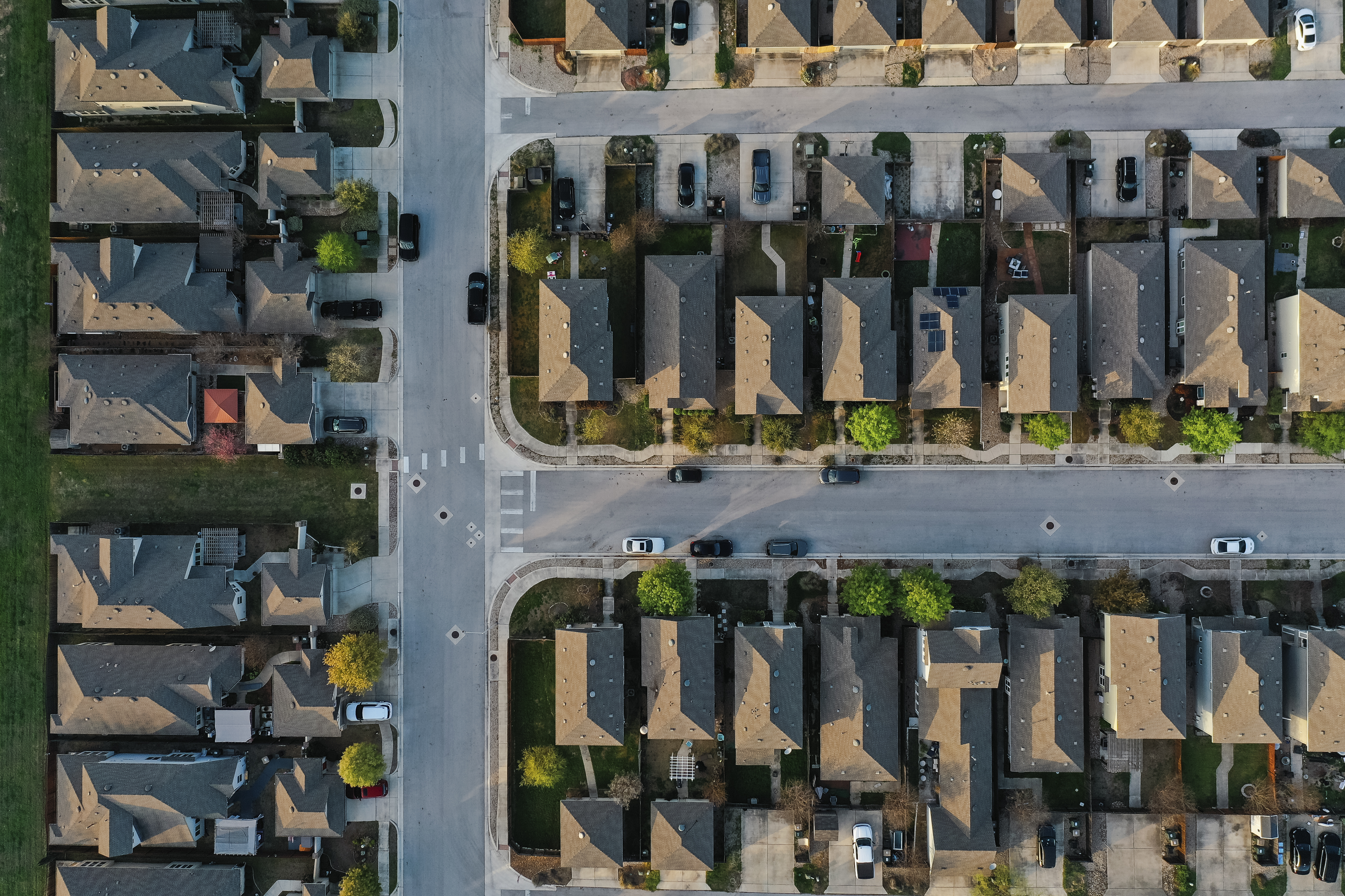 An aerial view of a suburban housing tract.