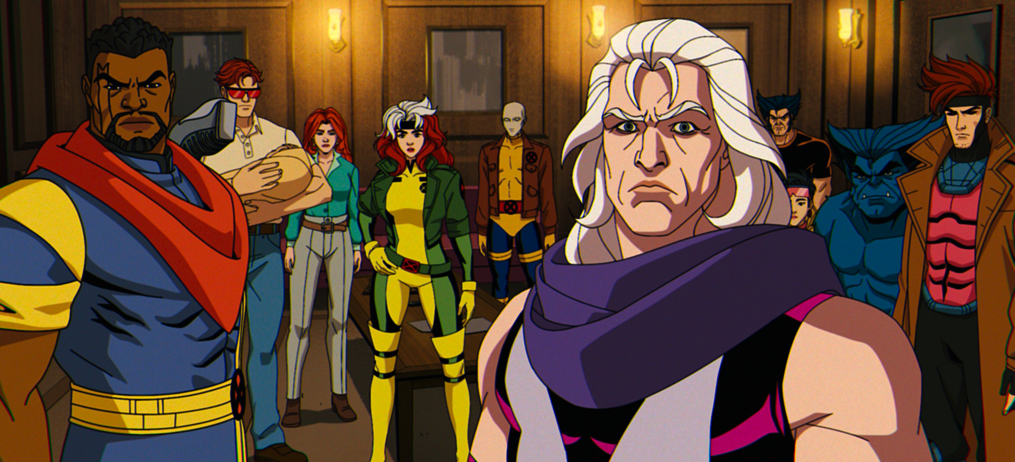 Magneto, with flowing white hair, wears a purple cowl-necked ensemble. His team of mutant superheroes stand behind him, wearing fitted outfits.