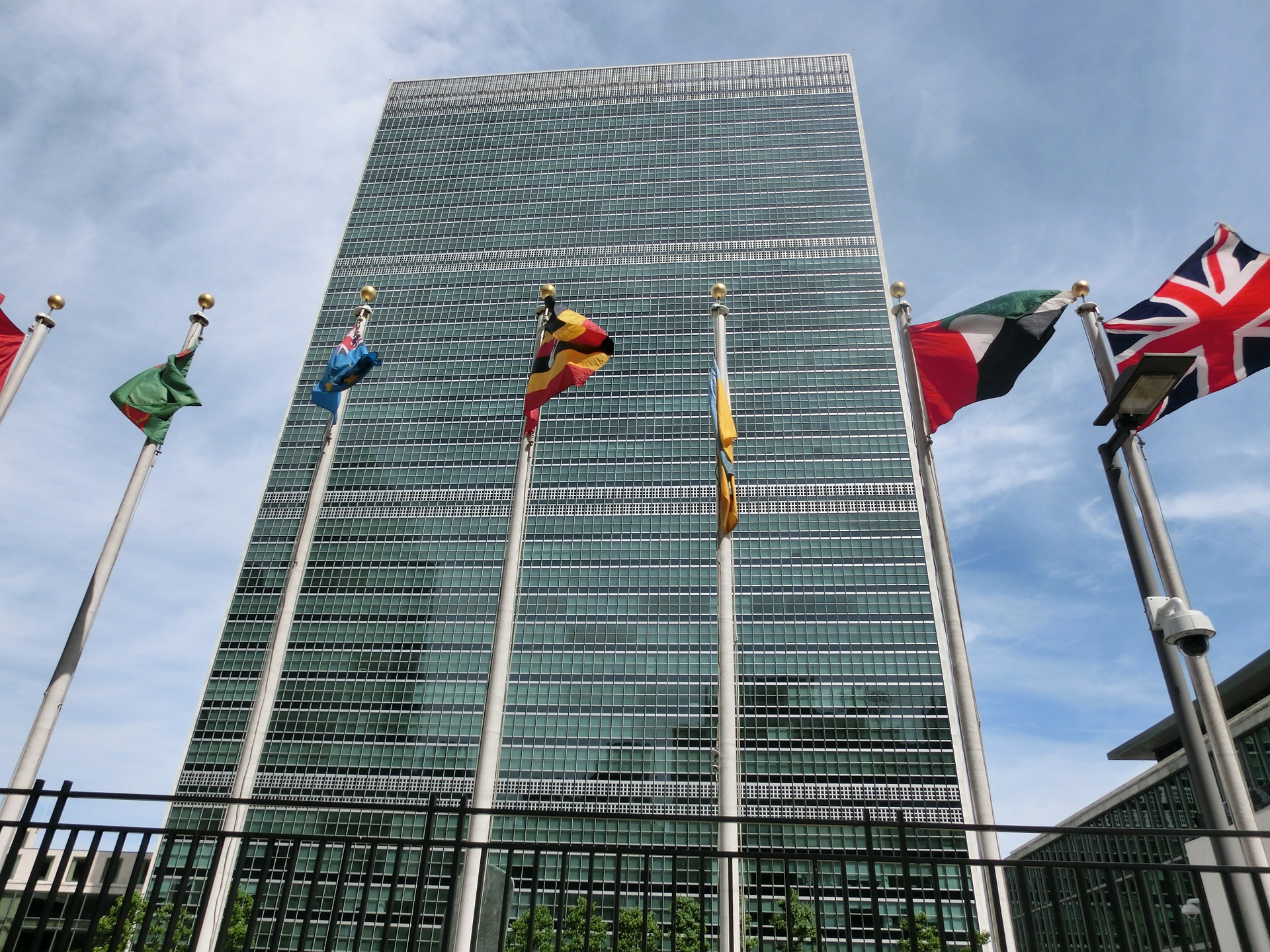 UN building in New Work with national flags in the foreground