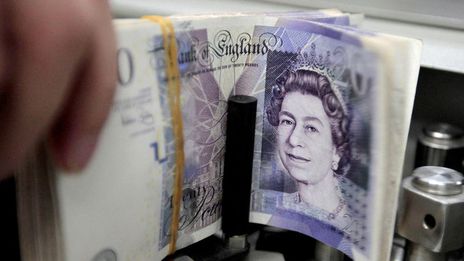 Sterling gives back some Fed-inspired gains, eyes on local elections