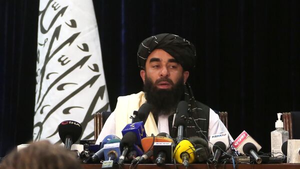 Представитель движения Талибан* Забиулла Муджахид