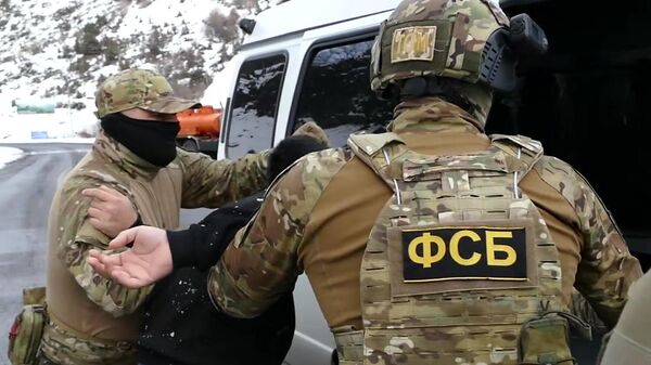Сотрудники ФСБ России во время задержания