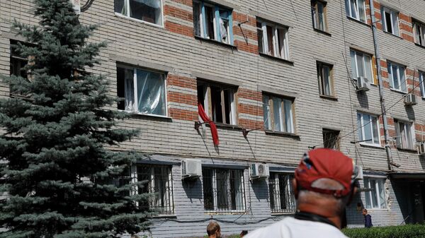 Выбитые стекла в окнах жилого дома в Белгороде