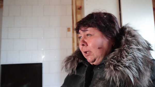 Жительница Петровского района Донецка после сильного обстрела