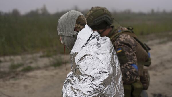 Раненый украинский военнослужащий