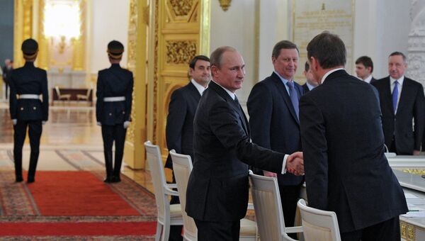 Президент России Владимир Путин перед началом заседания Государственного совета РФ в Кремле