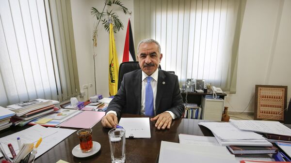 Новый премьер-министр Палестины Мухаммед Штайе в своем офисе в Рамалле. 10 марта 2019