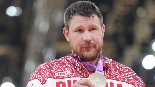Российский дзюдоист Александр Михайлин, завоевавший серебряную медаль