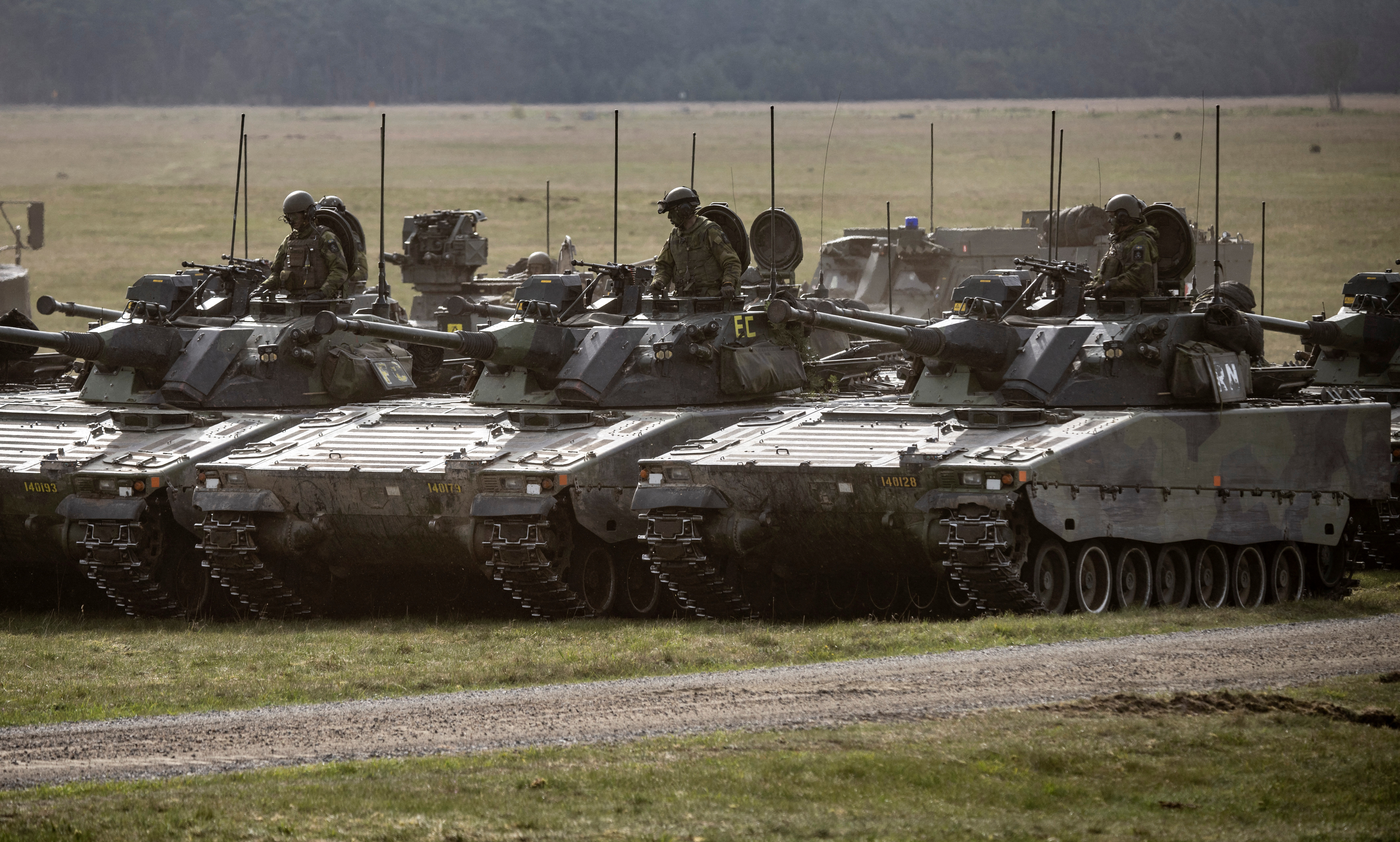 CV90 combat vehicles seen during the Aurora 23 military exercise at Rinkaby firing range outside Kristianstad
