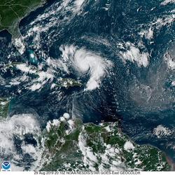 Image shows a satellite image of Hurricane Dorian as it approaches Florida
