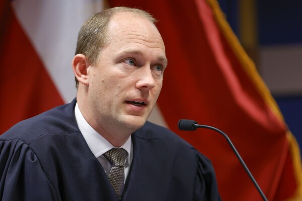 FILE- Fulton County Superior Judge Scott McAfee presides over a hearing, March, 1, 2024, in Atlanta. DeKalb Superior Court Judge Stacey Hydrick on Thursday, APril 25, 2024, upheld the disqualification of Tiffani Johnson, a candidate who had had planned to run against McAfee. (AP Photo/Alex Slitz, Pool, File)