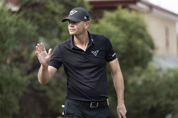 Brendan Steele of HyFlyers GC waves to the crowd during the second round of LIV Golf Adelaide at the Grange Golf Club Saturday, April 27, 2024 in Adelaide, Australia.(John Ferrey/LIV Golf via AP)
