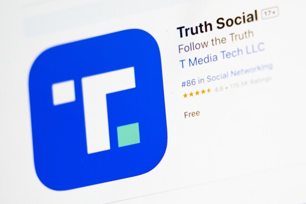The download screen for Truth Social app is seen on a laptop computer, Wednesday, March 20, 2024, in New York. Shareholders vote Friday on a deal to merge Trump Media & Technology Group, which runs Truth Social, and Digital World Acquisition Corp. — a special-purpose acquisition company, or SPAC., also referred to as a blank check company. (AP Photo/John Minchillo)