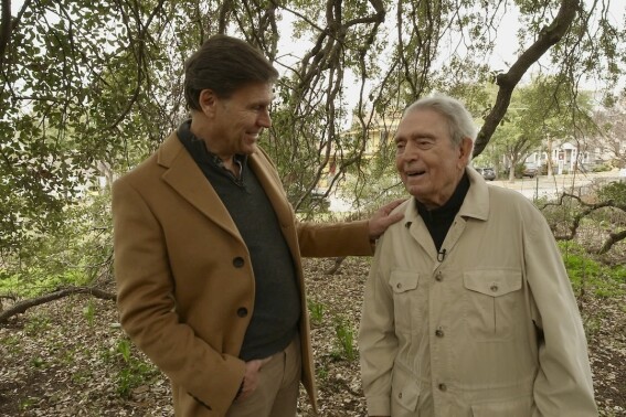 This photo provided by CBS News shows Dan Rather with CBS correspondent Lee Cowan during an interview on “CBS Sunday Morning." Rather returned to the CBS News airwaves Sunday, April 28, 2024, for the first time since his bitter exit 18 years ago, appearing in a reflective interview on “CBS Sunday Morning” days before the debut of a Netflix documentary on the 92-year-old newsman's life. (CBS News via AP)