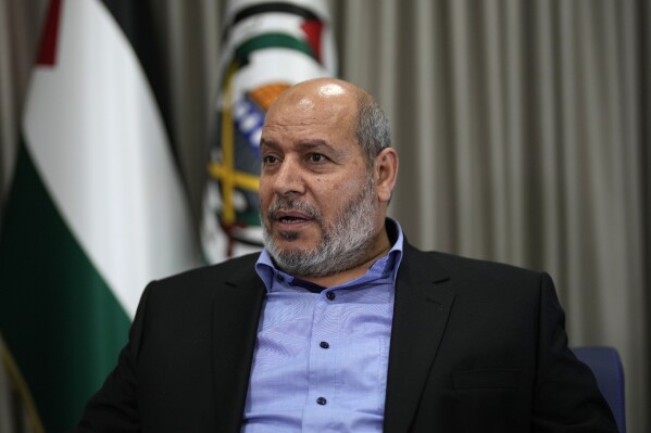 Khalil al-Hayya, a high-ranking Hamas official who has represented the Palestinian militant group in negotiations for a cease-fire and hostage exchange deal, speaks during an interview with The Associated Press, in Istanbul, Turkey, Wednesday, April 24, 2024. (AP Photo/Khalil Hamra)