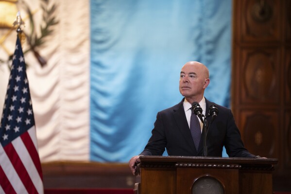 FILE - Homeland Security Secretary Alejandro Mayorkas takes part in a joint news conference with the Guatemalan president, at the National Palace in Guatemala City, March 21, 2024. Speaker Mike Johnson will delay sending the House’s articles of impeachment against Homeland Security Secretary Alejandro Mayorkas to the Senate this week as planned. Republican senators requested more time Tuesday to build a case for a full trial.(AP Photo/Santiago Billy)