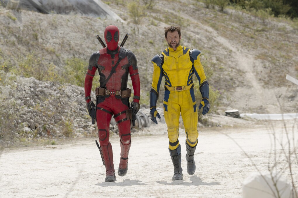 This image released by 20th Century Studios/Marvel Studios shows Ryan Reynolds as Deadpool/Wade Wilson and Hugh Jackman as Wolverine/Logan in a scene from "Deadpool & Wolverine." (20th Century Studios/Marvel Studios via AP)