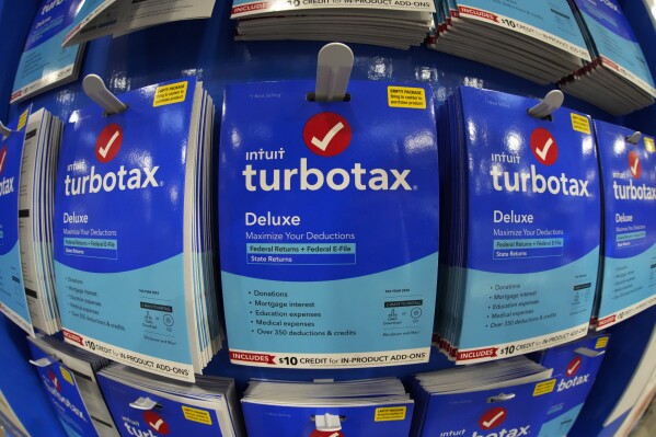 FILE - TurboTax is displayed in a Costco warehouse in Pittsburgh on Jan. 26, 2023. It's tax season in the U.S., and for many people, filing tax returns can be a daunting task that's often left until the last minute. (AP Photo/Gene J. Puskar, File)