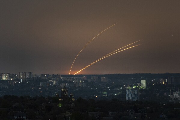 Russian rockets are launched against Ukraine from Russia's Belgorod region, seen from Kharkiv, Ukraine, on Thursday, April 18, 2024. (AP Photo/Evgeniy Maloletka)