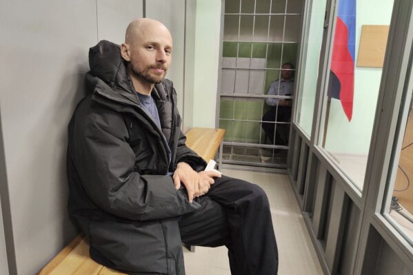 Russian journalist Sergey Karelin appears in court in the Murmansk region of Russia, Saturday April 27, 2024, after his arrest on “extremism” charges, which he denied. (AP Photo)