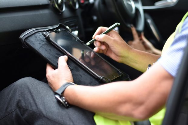 Driving examiner using a tablet