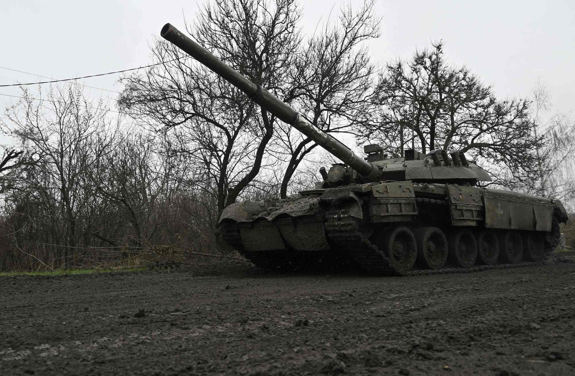 A Ukrainian tank rolls on a muddy road near Bakhmut on Wednesday.