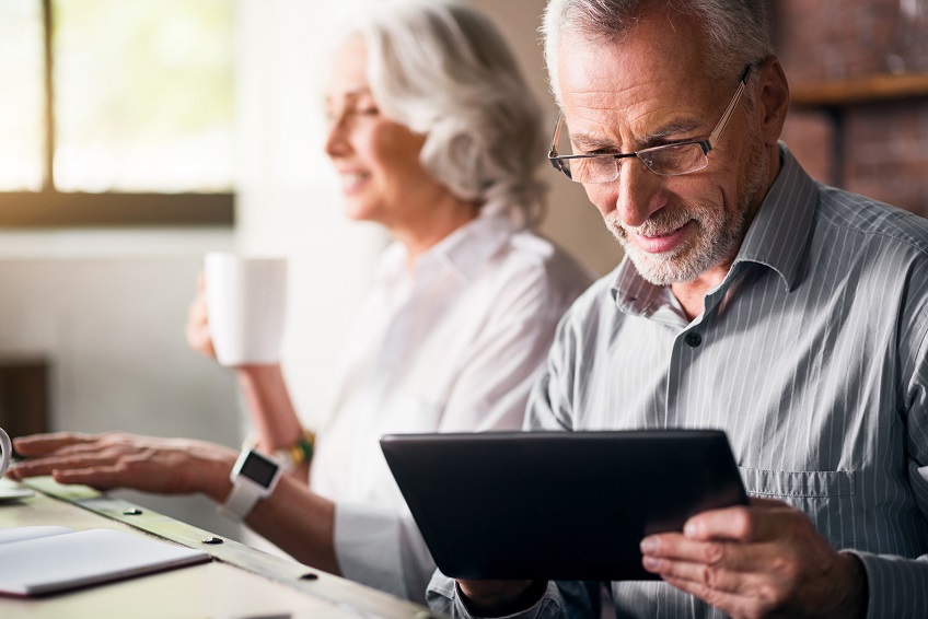 Elderly Couple On Tablet