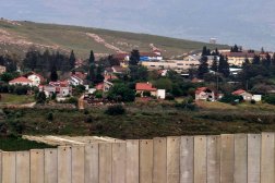 28 April 2024, Lebanon, Kfar Kila: A picture taken from the southern Lebanese border village with Israel Kfar Kila shows deserted and destroyed houses in the Israeli settlement of Muttleh. Photo: STR/dpa