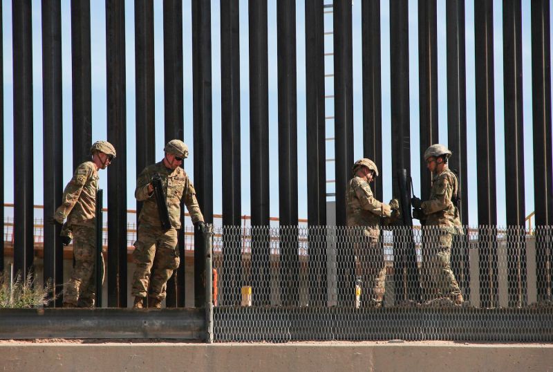 U.S. soldiers reinforce the U.S.-Mexico border fence