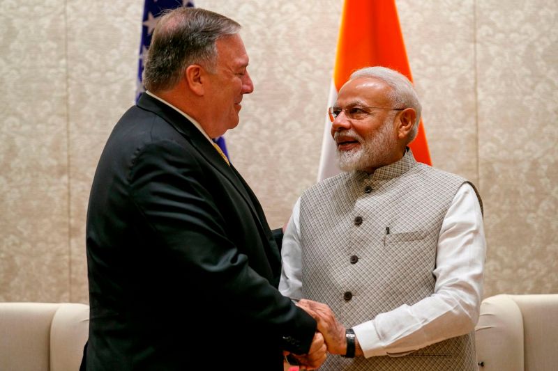 U.S. Secretary of State Mike Pompeo shakes hands with Indian Prime Minister Narendra Modi during their meeting at the prime minister's residence in New Delhi, India, on June 26, 2019.