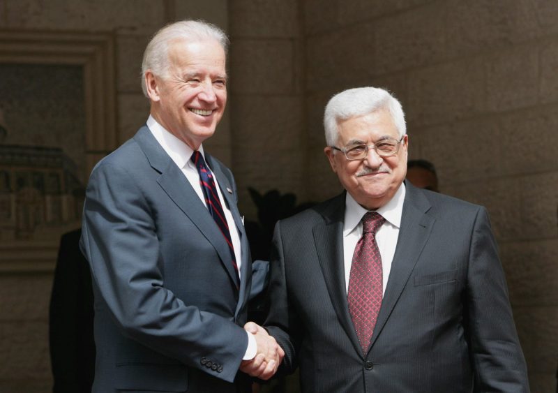 Palestinian President Mahmoud Abbas and U.S. Vice President Joe Biden shake hands prior to their meeting at the presidential compound in in Ramallah, West Bank, on March 10, 2010.