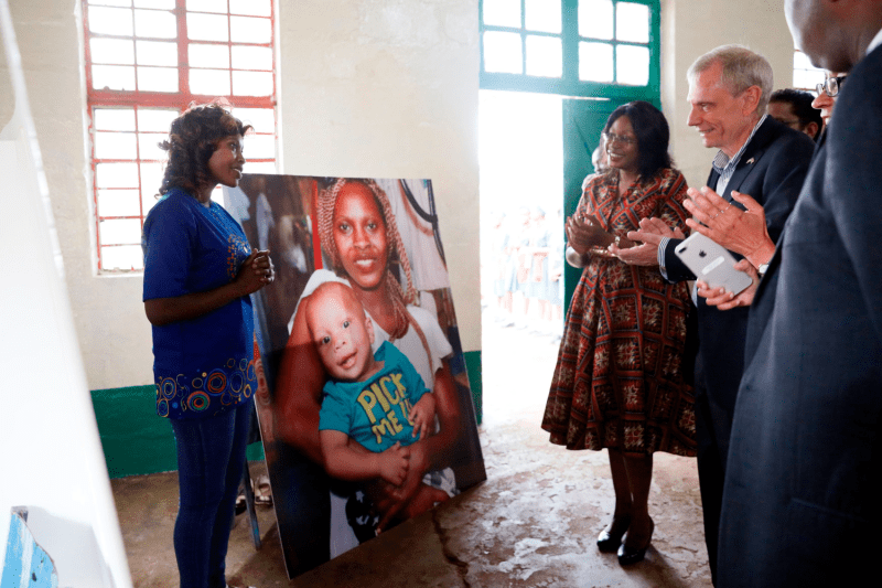 U.S. Ambassador to Kenya Robert Godec (right) visits a PEPFAR project for girls’ empowerment in Nairobi on March 10, 2018.