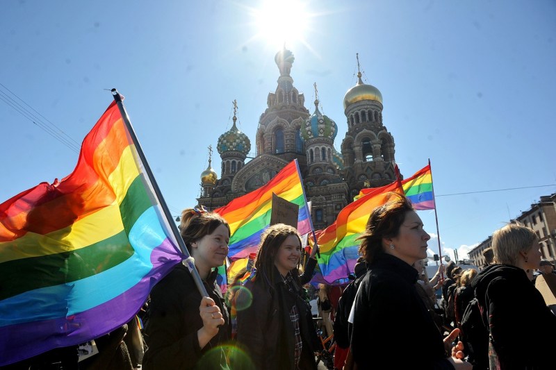 Gay rights activists march during a rally against Russia’s then-proposed “gay propaganda” law in St. Petersburg, Russia, on May 1, 2013.