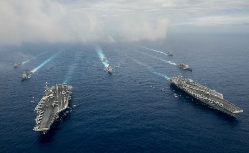 The Nimitz-class aircraft carriers USS John C. Stennis, left, and USS Ronald Reagan conduct dual aircraft carrier strike group operations in the U.S. 7th Fleet area of operations in support of security and stability in the Indo-Pacific.